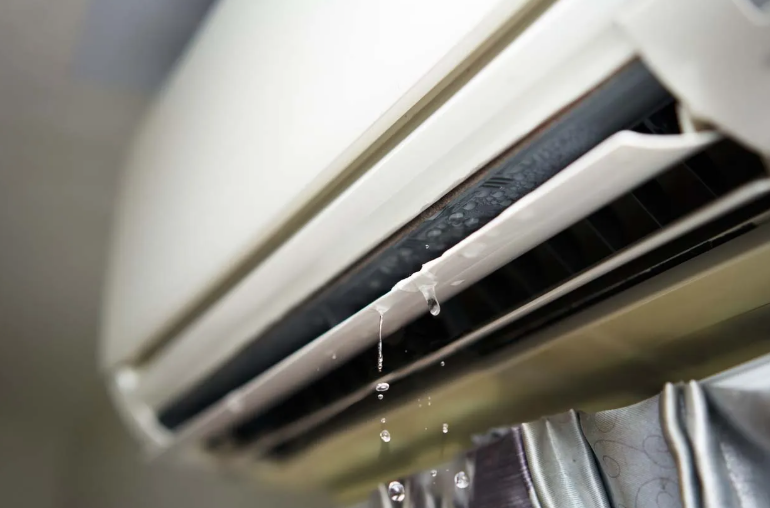 Water dripping from a leaking indoor mini-split unit